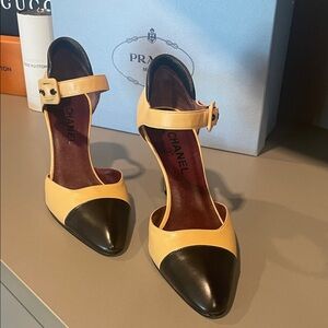 CHANEL Tan and Black Pointed Mary Jane Heels with Ankle Strap.